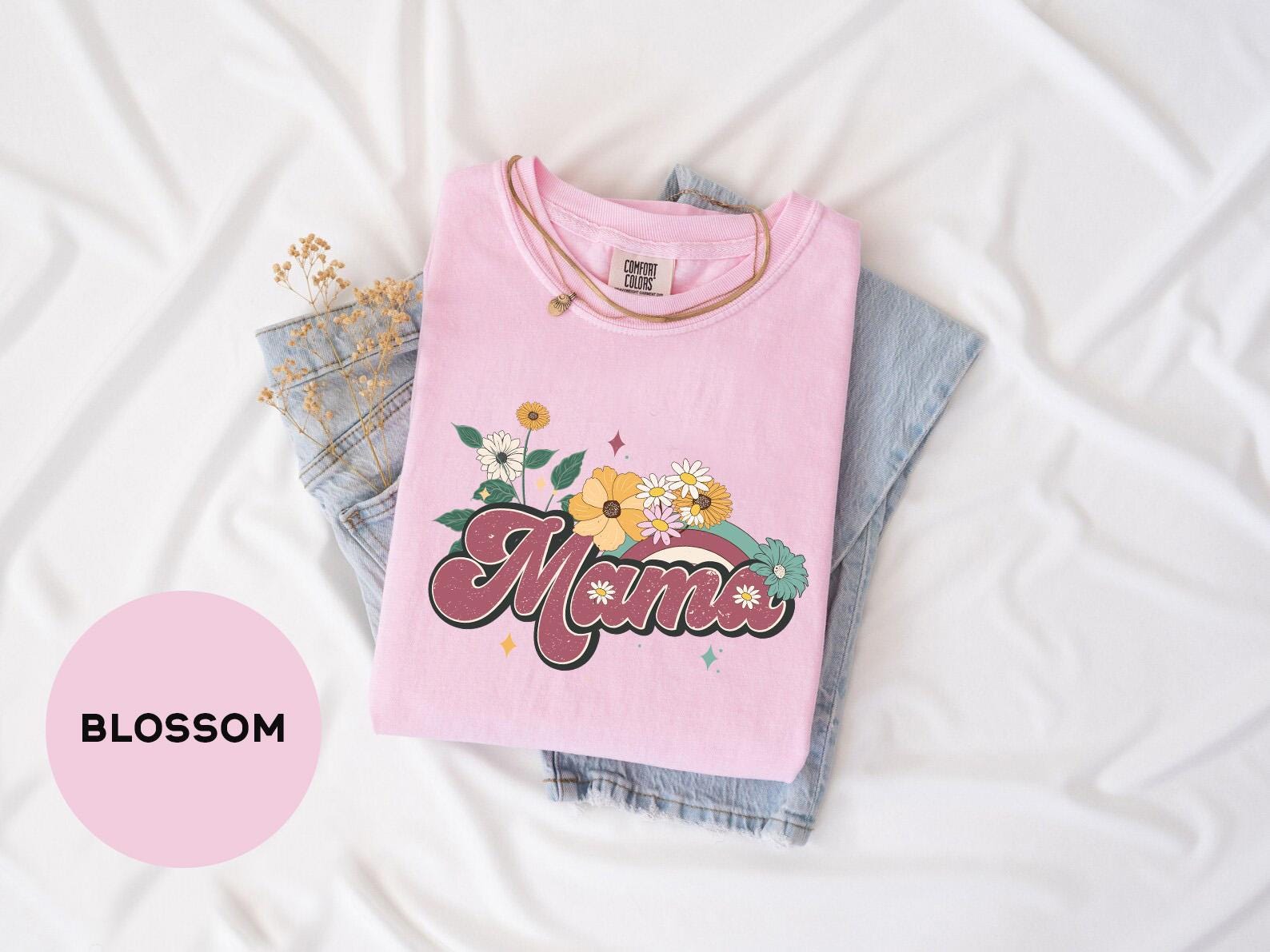 a pink shirt with the word mama on it