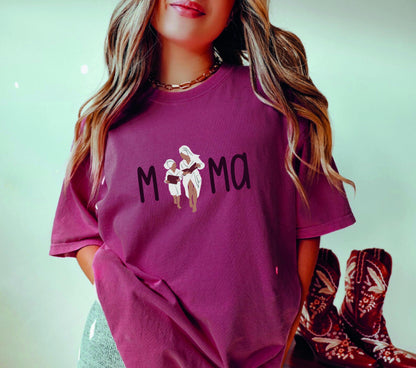 a woman wearing a t - shirt with flowers on it