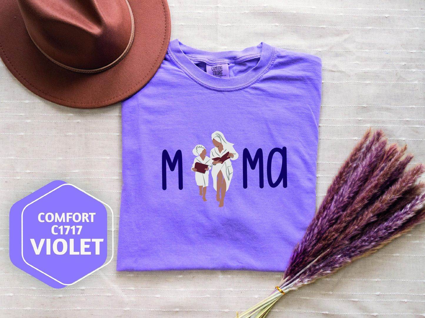 a purple shirt with a picture of two women on it
