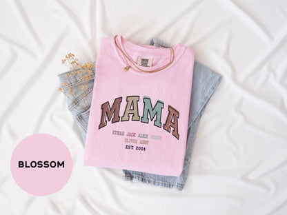 a pink shirt with the word mama printed on it