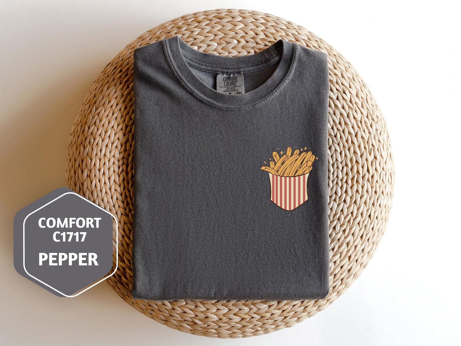 a t - shirt with a picture of a french fries pocket on it