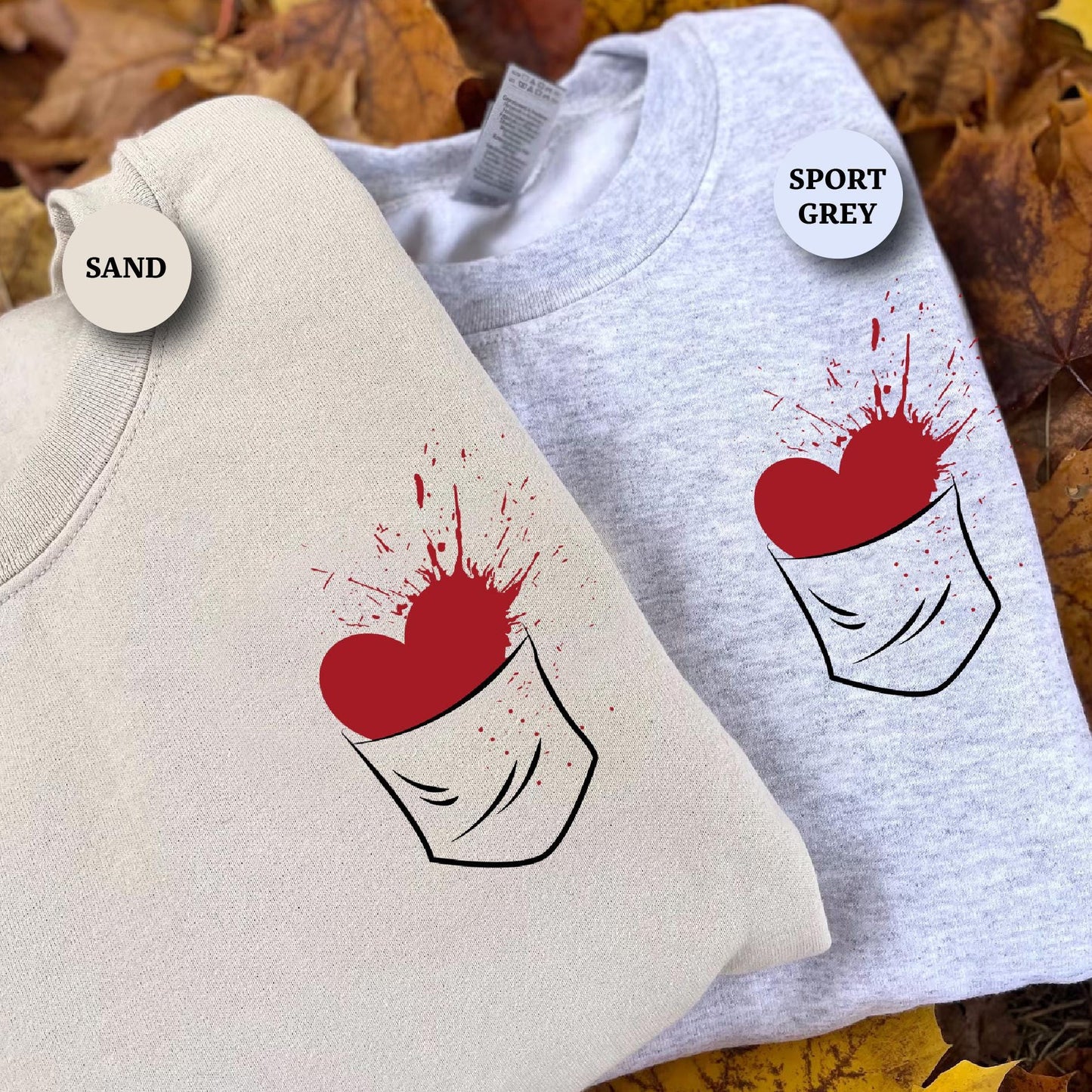 a couple of shirts that are on some leaves