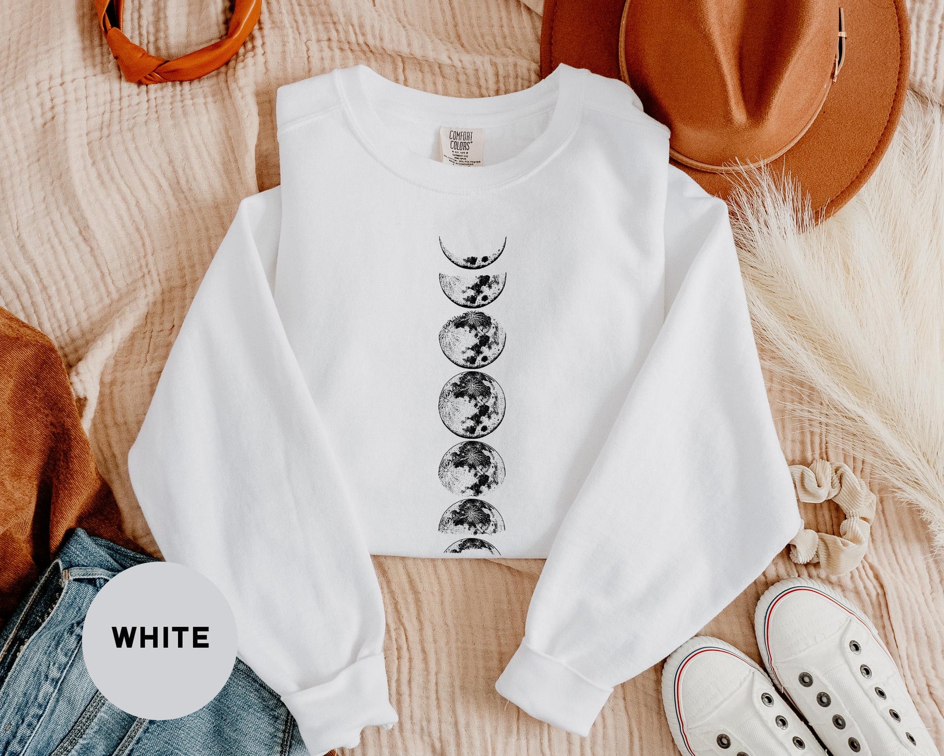 a white shirt with a black and white graphic on it