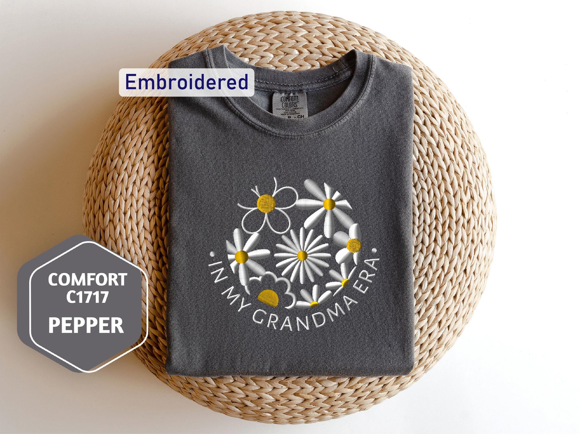 a t - shirt with a picture of a flower on it
