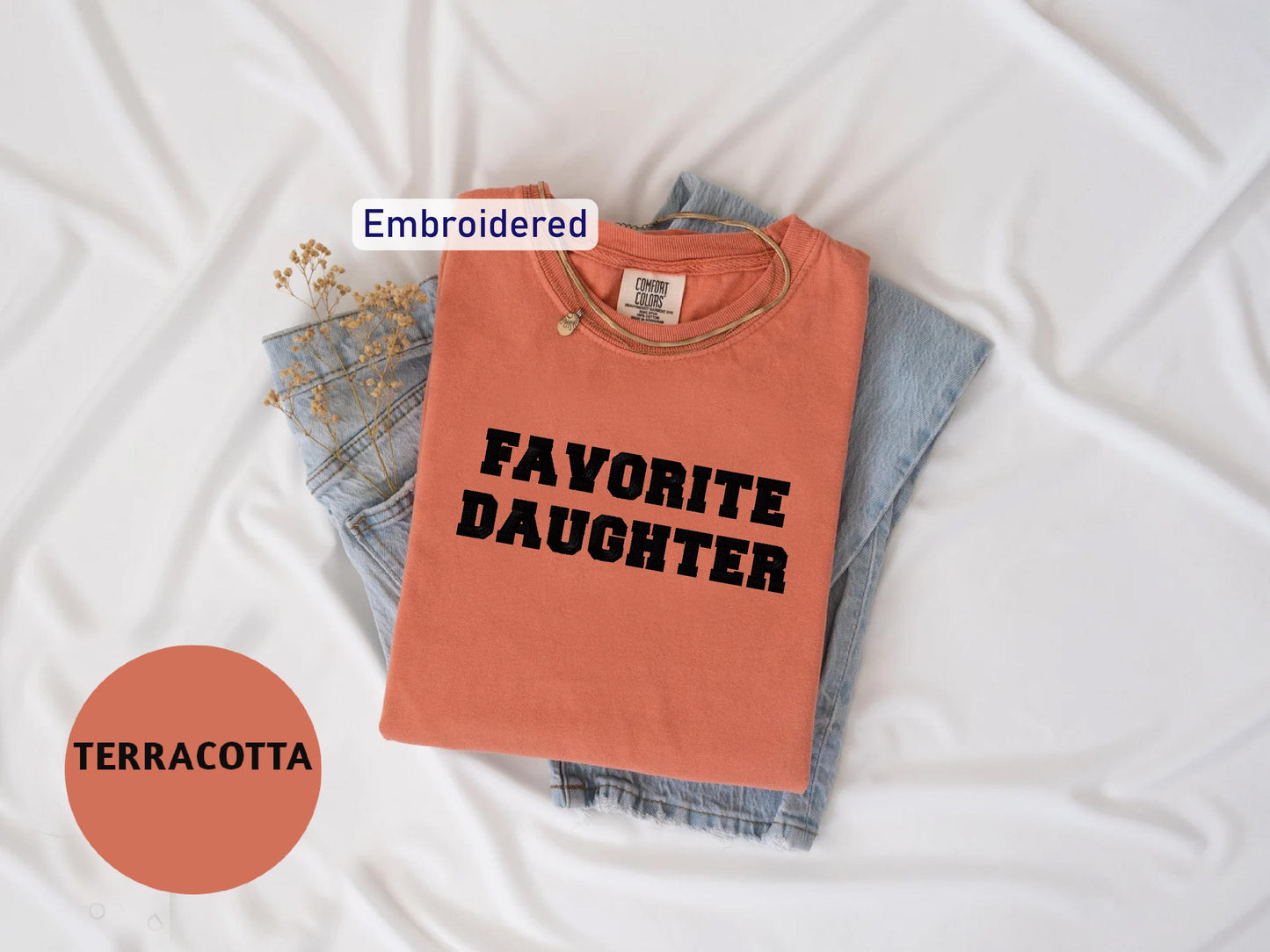 a t - shirt that says favorite daughter on it