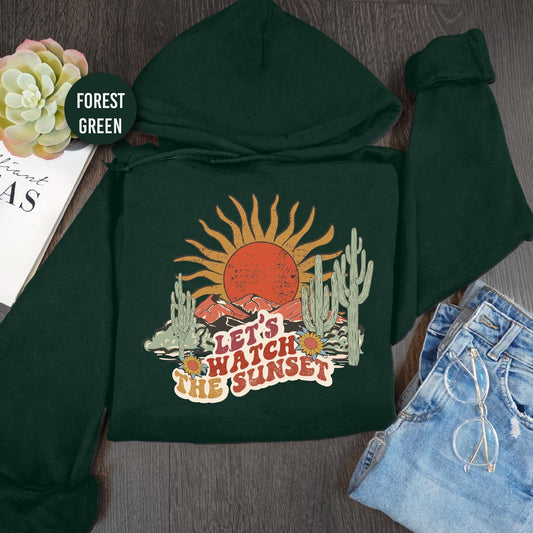 a green hoodie with an image of a sun on it