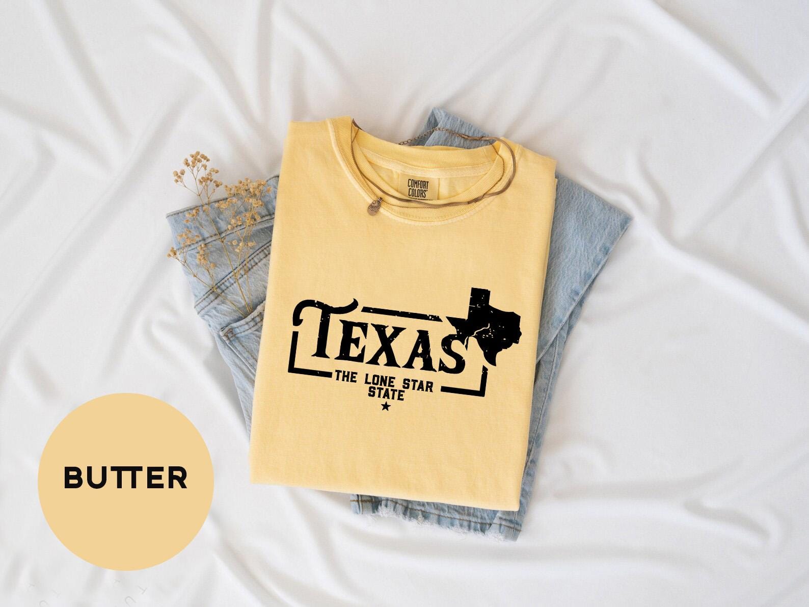 a t - shirt that says texas is the state of texas