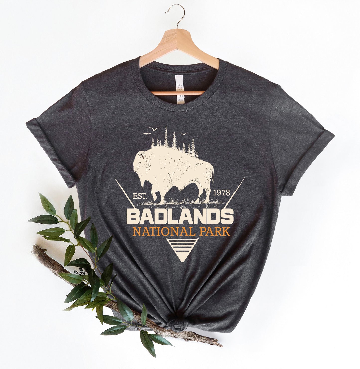 a t - shirt with a picture of a buffalo and the words badlands national