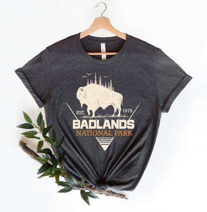a t - shirt with a picture of a buffalo and the words badlands national