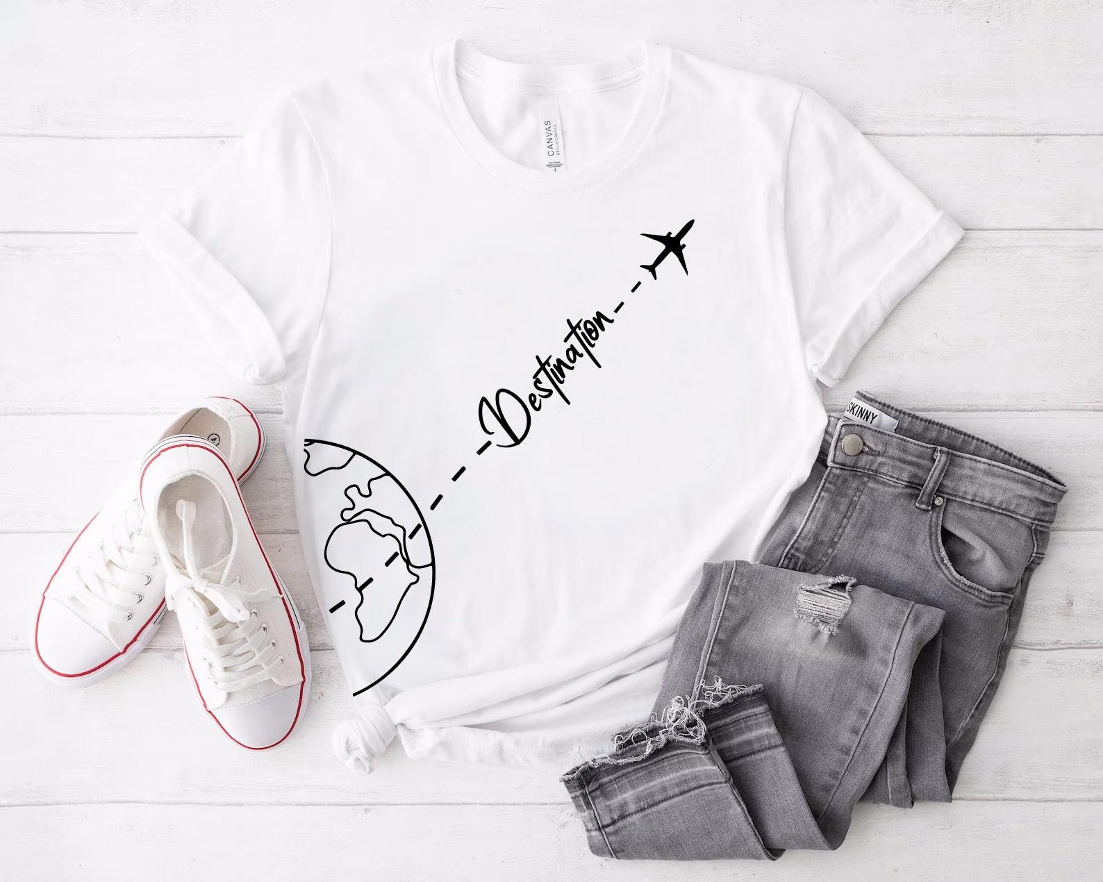 a white t - shirt with the words, i love you, and an airplane