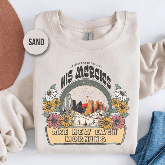 a t - shirt with a picture of the mountains and trees on it
