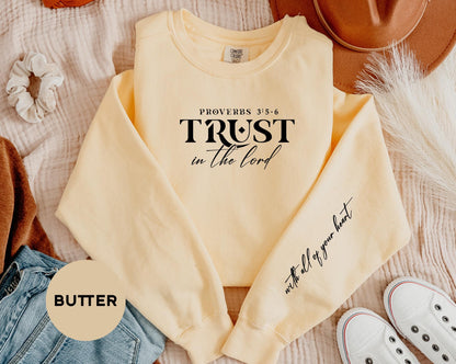 a yellow shirt with the words trust in the lord written on it
