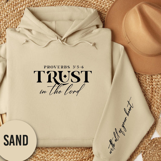 a white hoodie with the words trust in the lord written on it