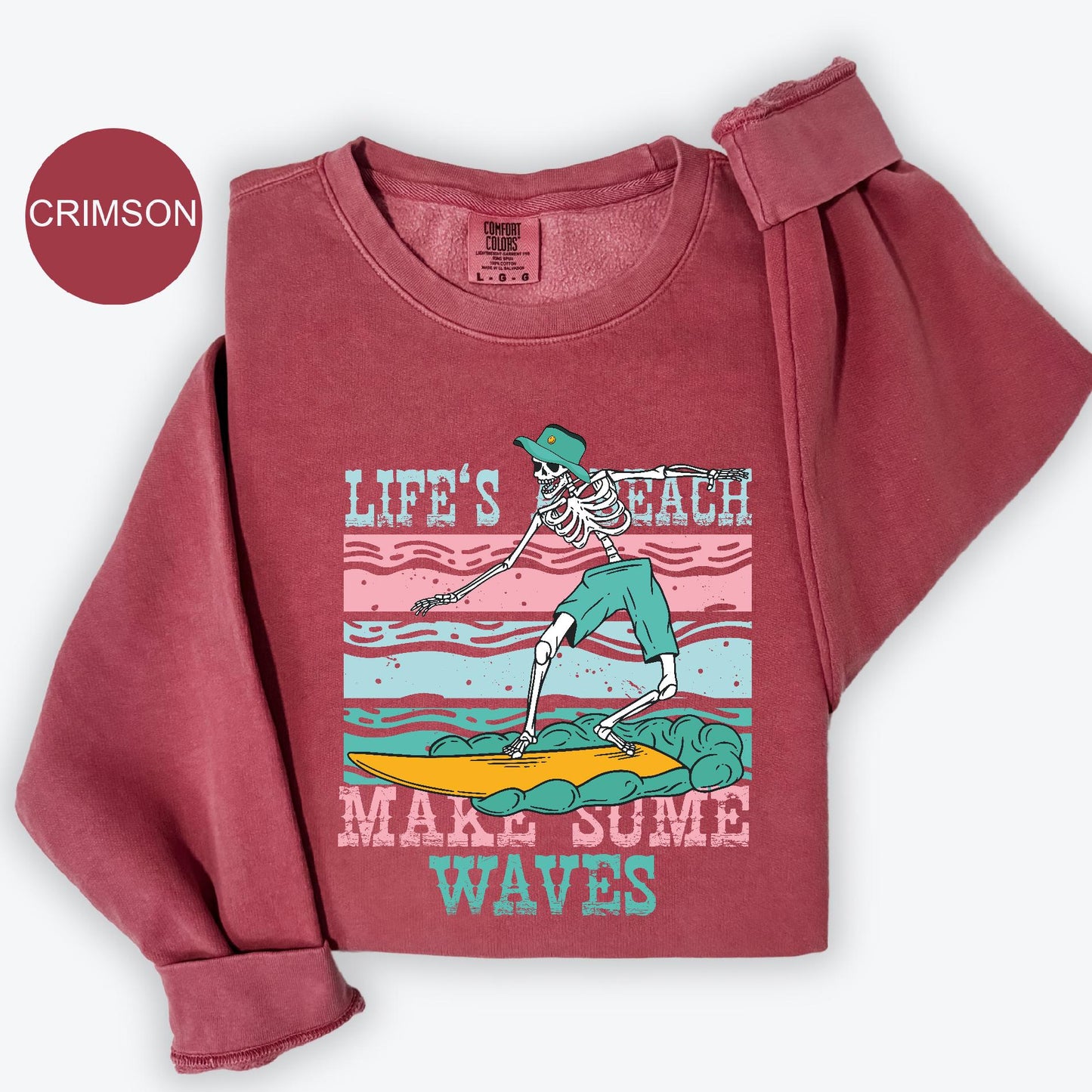 a pink shirt with a skeleton on it