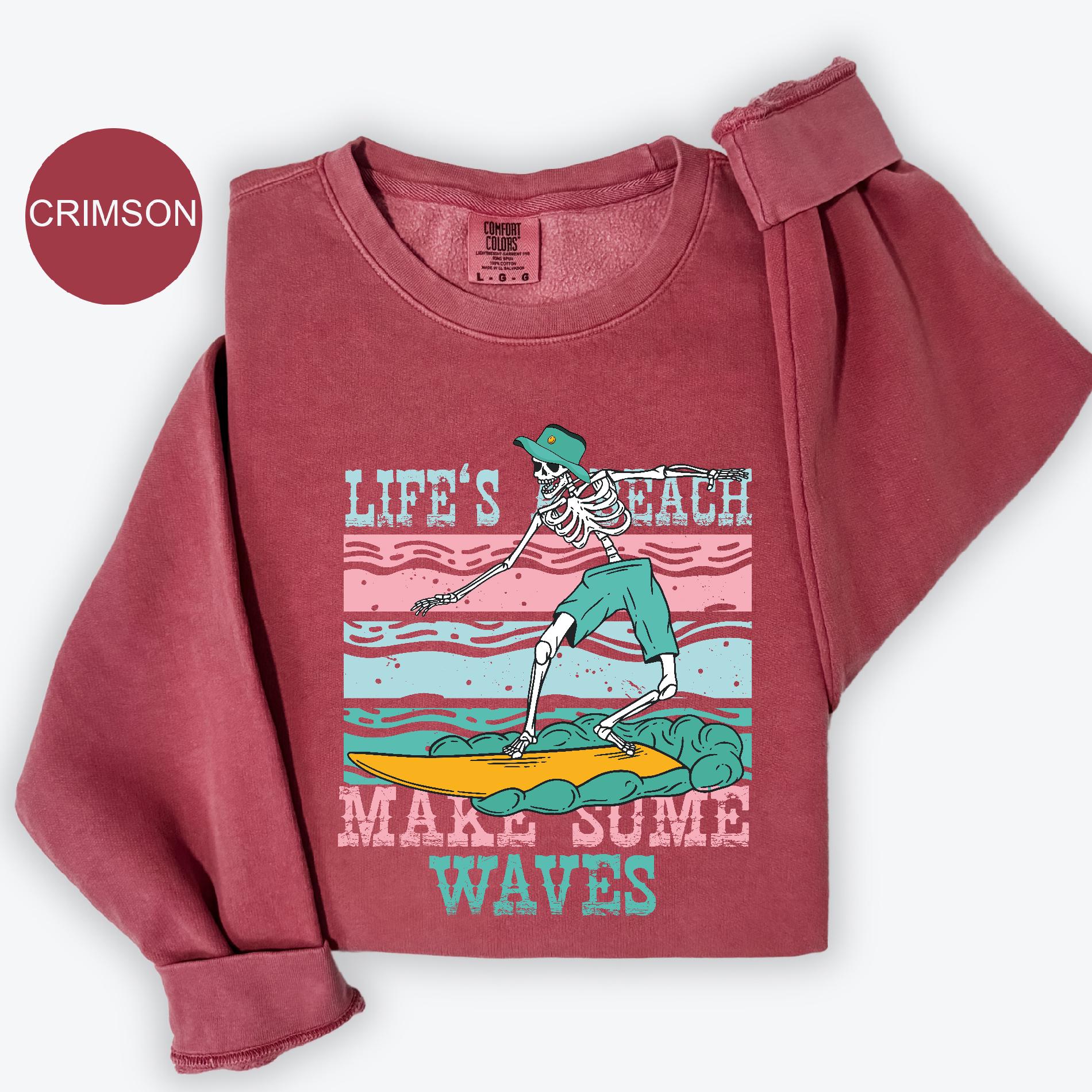 a pink shirt with a skeleton on it
