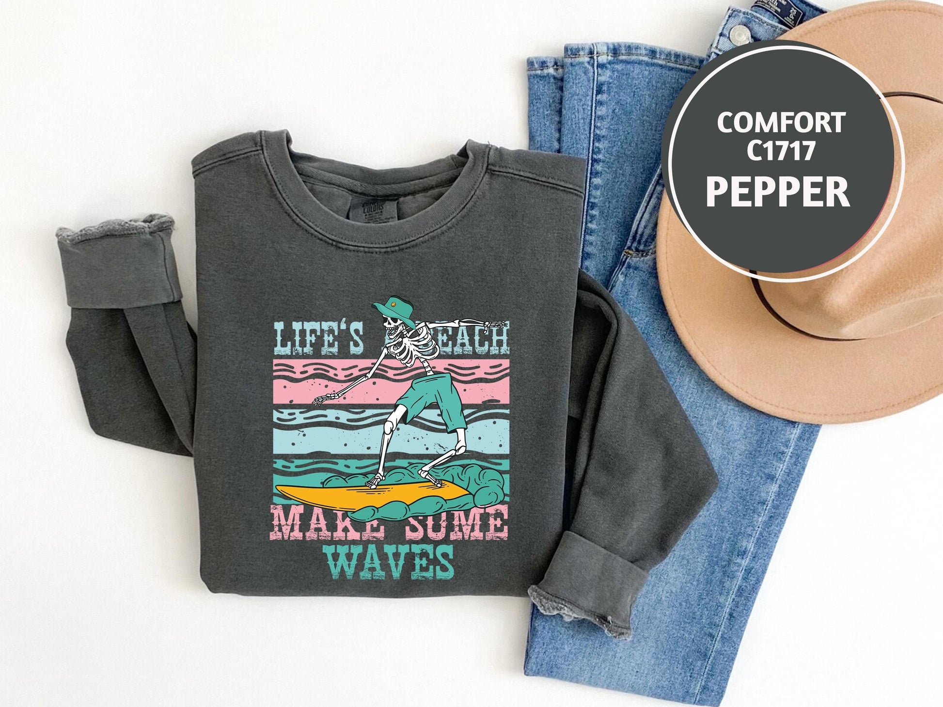 a pair of jeans, a hat, and a t - shirt