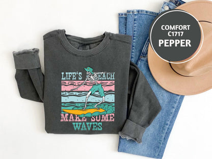 a pair of jeans, a hat, and a t - shirt
