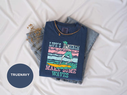 a t - shirt that says life's tough make some waves