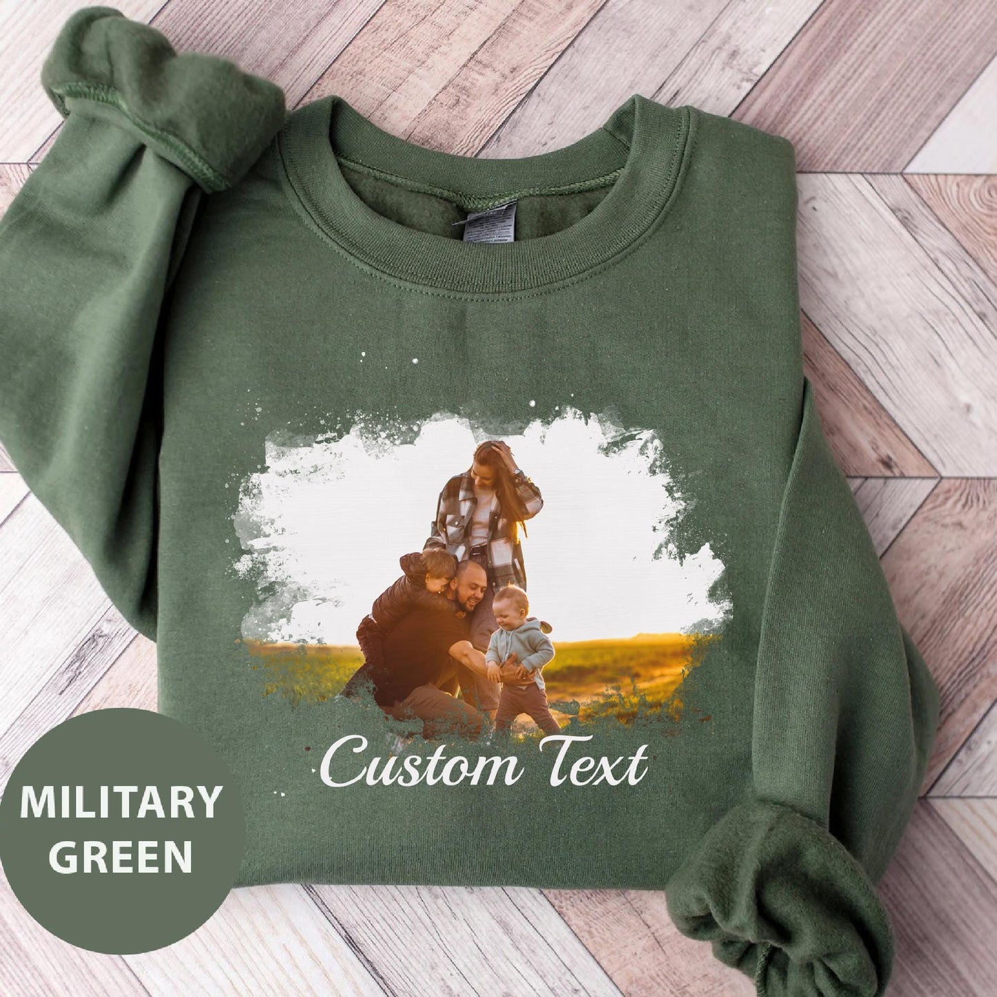 a green sweatshirt with a picture of a family on it