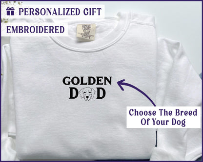 a white t - shirt with the words golden dad and a picture of a dog