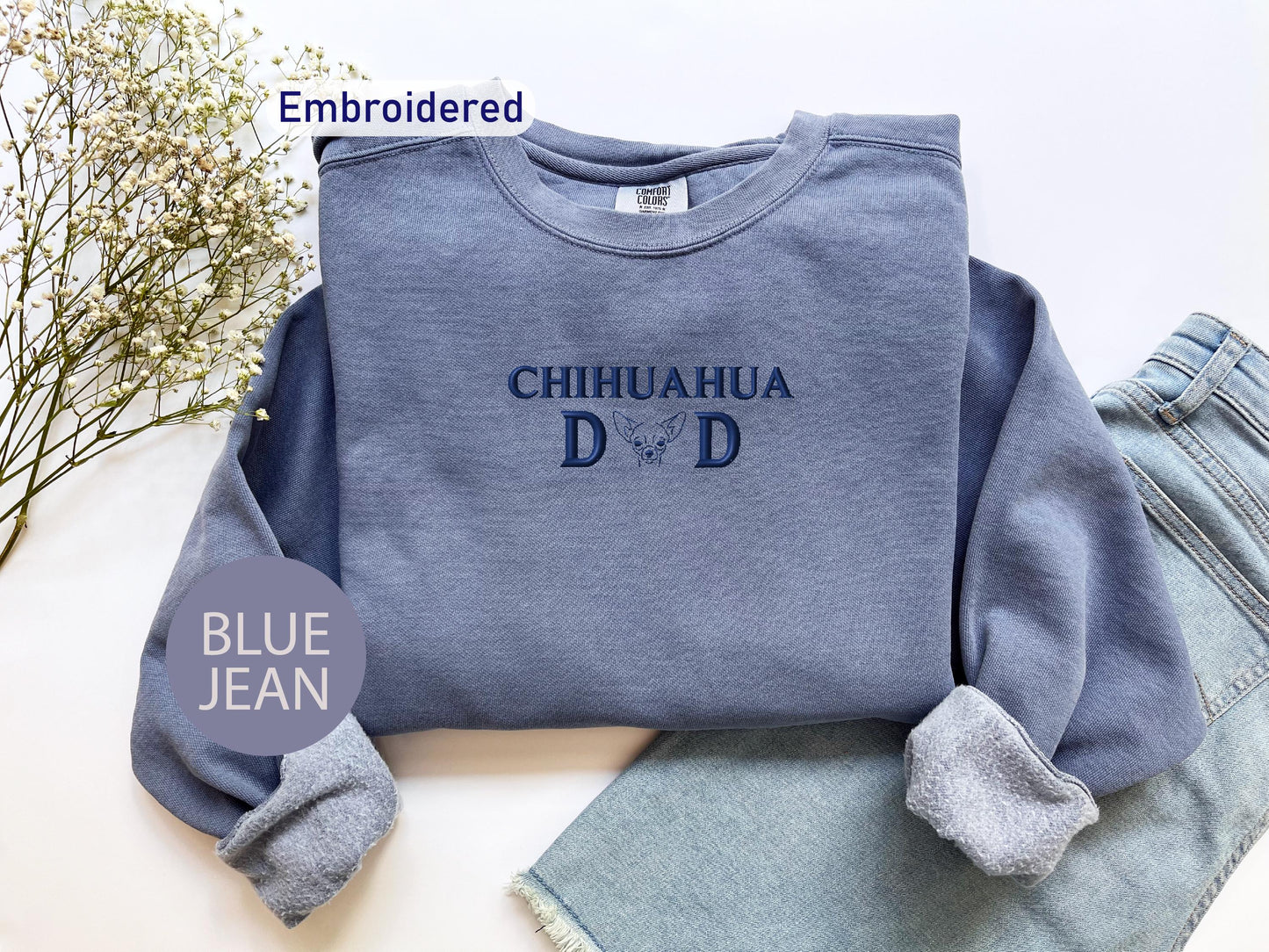 a blue jean outfit with the words chihuahua dad on it