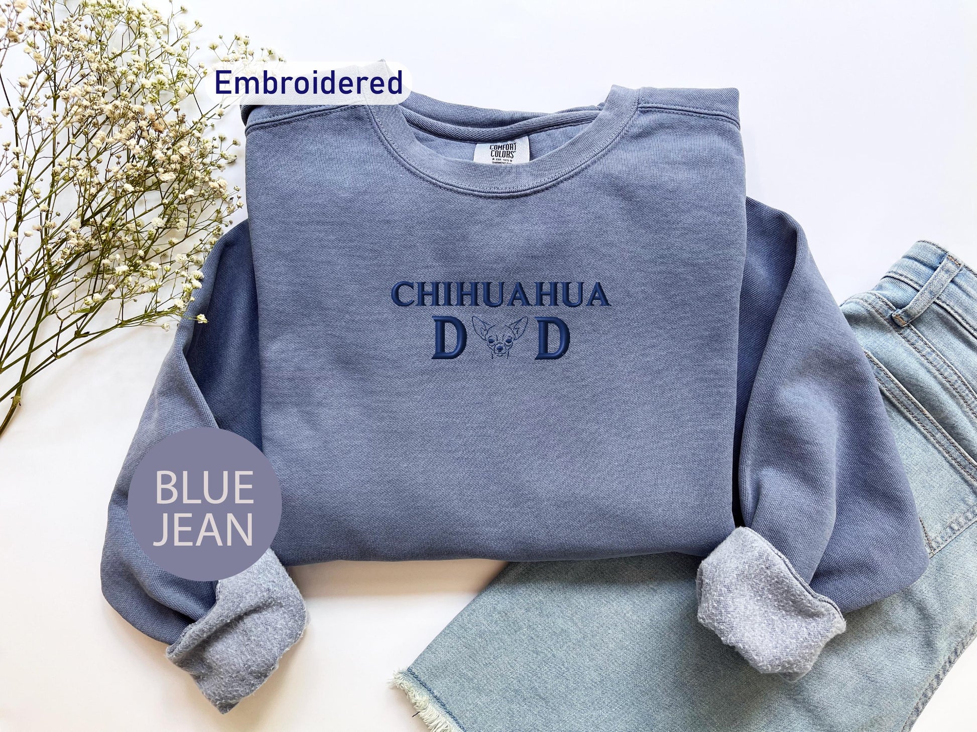 a blue jean outfit with the words chihuahua dad on it