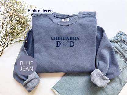 a blue jean outfit with the words chihuahua dad on it