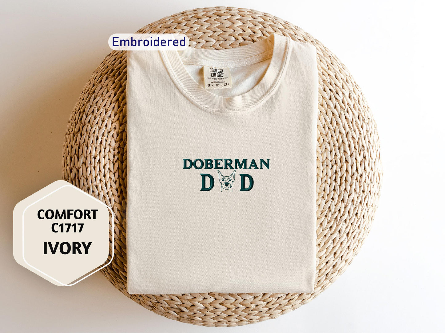 a white t - shirt with the words doberman and d on it