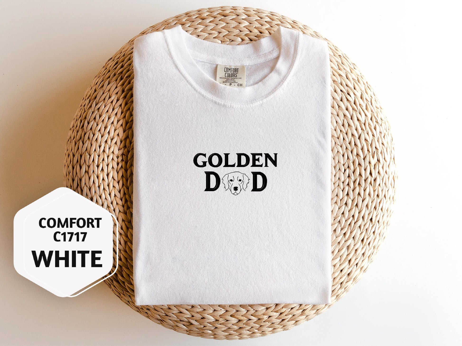 a white t - shirt with the words golden dad printed on it