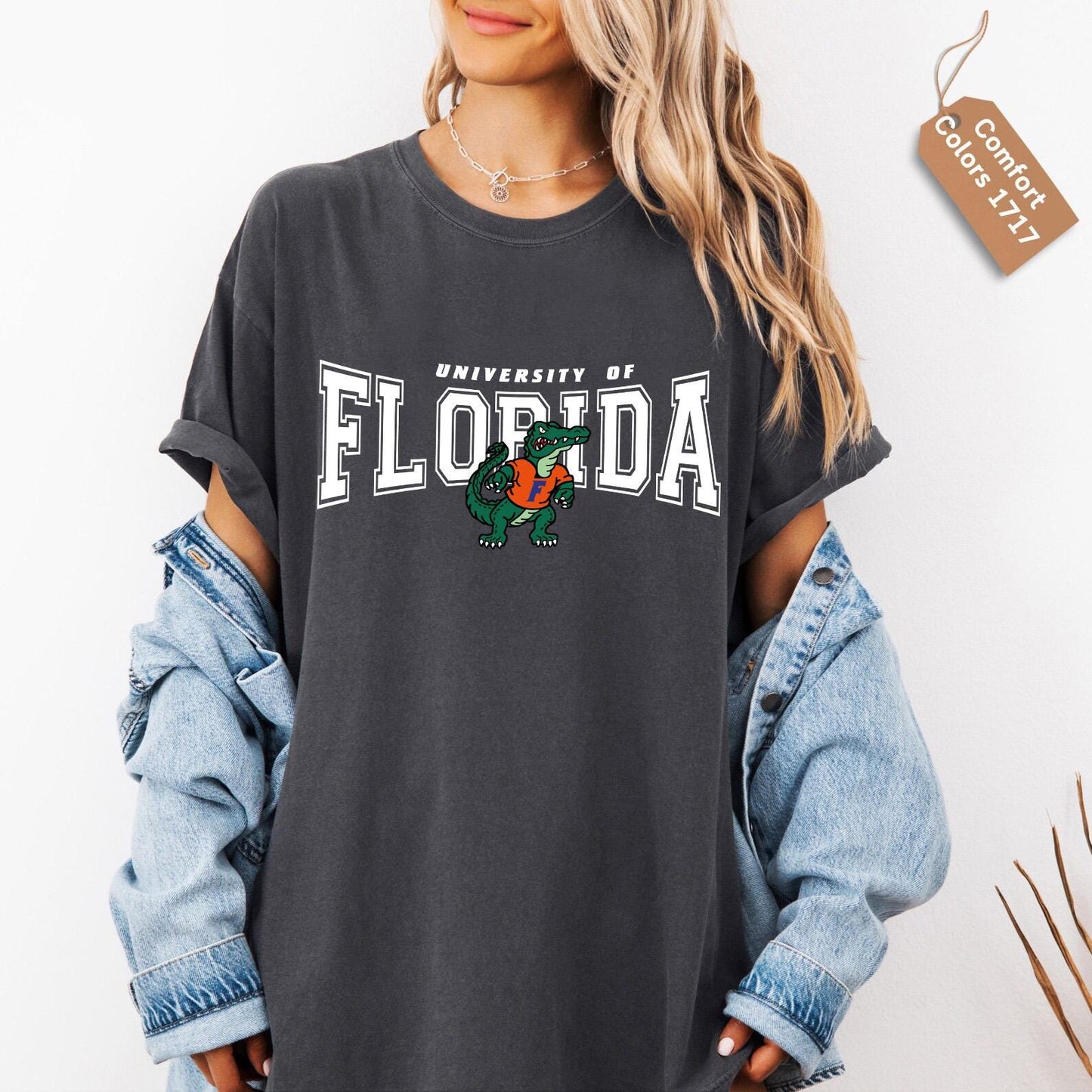 a woman wearing a black shirt that says university of florida