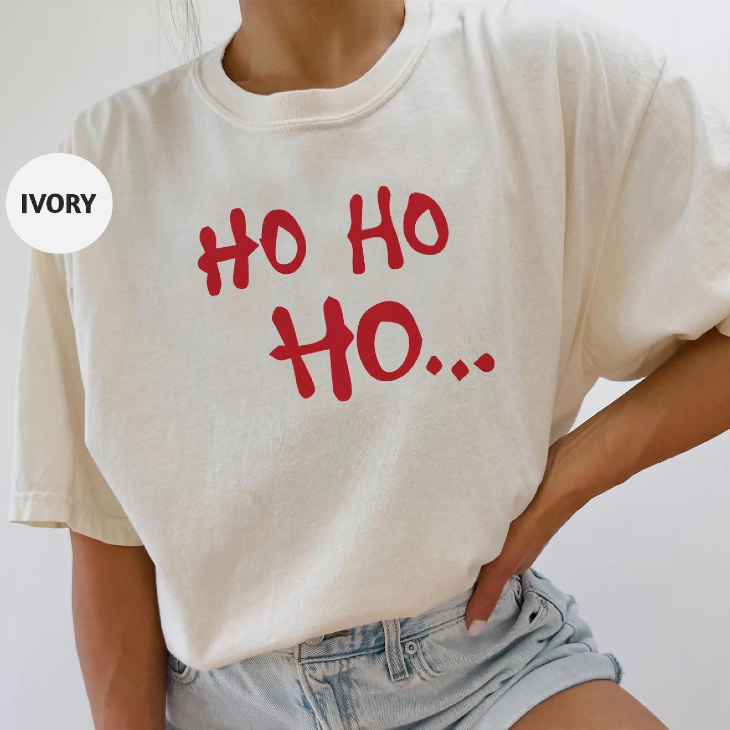 a woman wearing a t - shirt that says ho ho