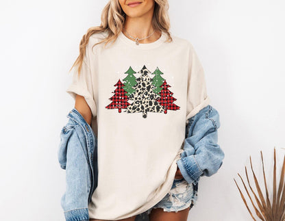 a woman wearing a leopard print christmas tree t - shirt