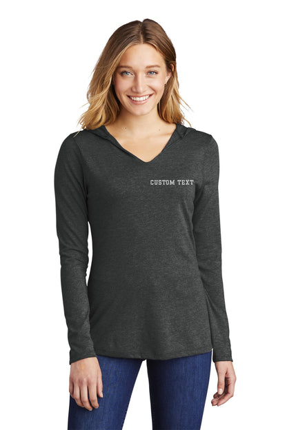 a woman wearing a long sleeve shirt with the words custom fit on it